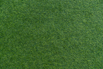 Top view of green artificial grass. for background and textured.
