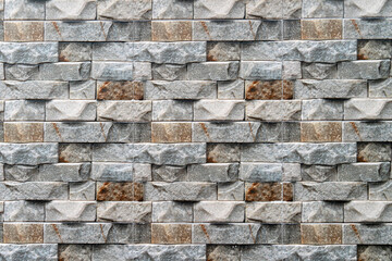 Background and textured of brick pieces with stone pattern. Use for wall of house or fence wall.