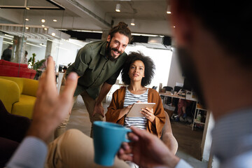 Multiethnic group of happy business people working together in office