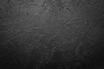 Black stone concrete background. Top view.