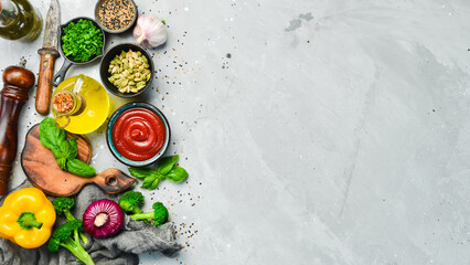 Cooking banner. Background with spices and vegetables. Top view. Free space for your text.