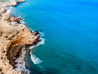 Camper on coast in Spain. Aerial view