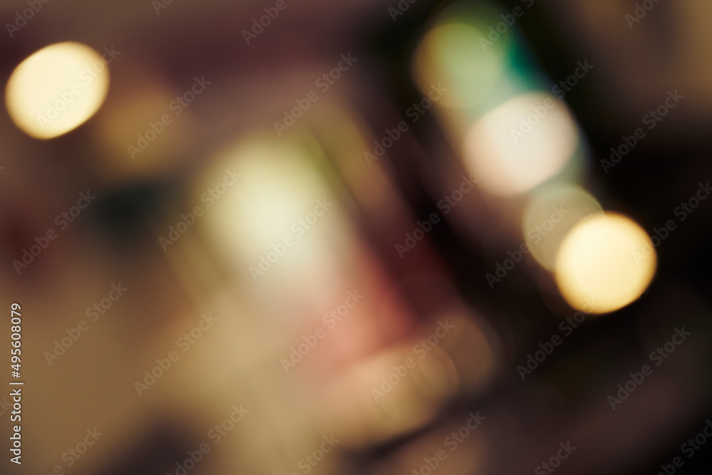 Wall mural defocused image of illuminated lights at night