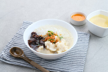 Tekwan, traditional food from Palembang, Indonesia. Made from a mixture of fish meat and tapioca, which is shaped into small balls, with vermicelli, mushrooms, spring onions, celery. Selected focus.
