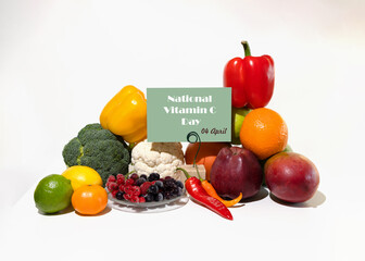 National vitamin C day concept. A set of natural products rich in vitamin C ascorbic acid. Cardboard sign with the inscription.