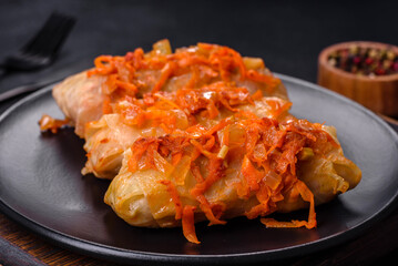 Cabbage rolls stuffed with ground beef and rice in tomato sauce