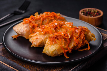 Cabbage rolls stuffed with ground beef and rice in tomato sauce
