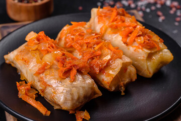 Cabbage rolls stuffed with ground beef and rice in tomato sauce