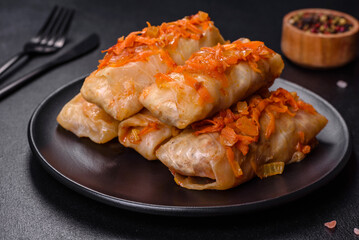 Cabbage rolls stuffed with ground beef and rice in tomato sauce