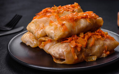 Cabbage rolls stuffed with ground beef and rice in tomato sauce