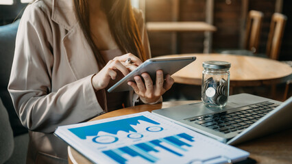 Working Process in Modern Office. Young Woman Account Manager Working at Table with New Business Project. Typing keyboard,Using Contemporary Laptop.
