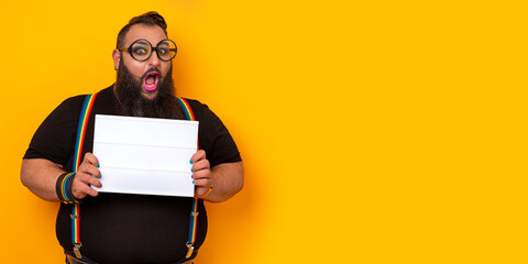 Big funny bearded man wearing glasses and holding a blank lightbox