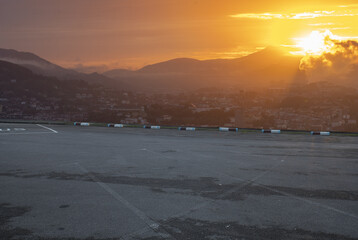 cgi backplate production.asphalt car park with beautiful city skyline