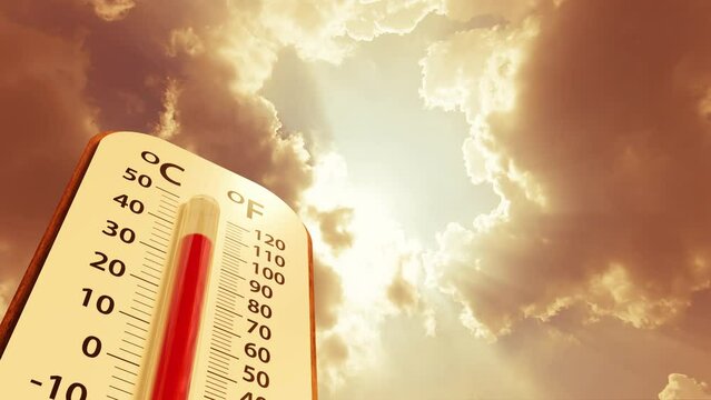 climate change, low angle view Thermometer on blue sky with sun shining change to orange sky in summer show higher Weather, concept global warming 