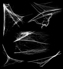 Overlay the cobweb effect. A collection of spider webs isolated on a black background. Spider web...