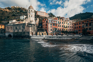 view of the town of vernazza by the sea in italy