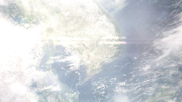 Earth zoom in from outer space to city. Zooming on Kampong Cham, Cambodia. The animation continues by zoom out through clouds and atmosphere into space. Images from NASA
