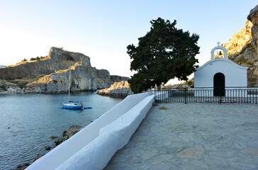 Lindos, Greece St. Pauls Bay Chapel view to the acropolis and the rocky bay