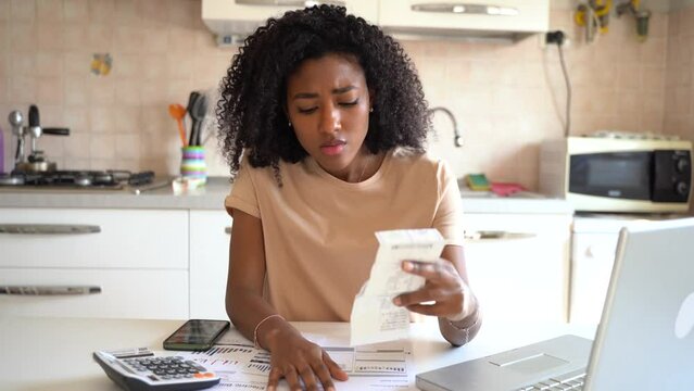 Video about black woman worried about home expenses