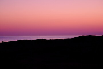A nice landscape and sunset from the  rocky coast of Batz-sur-Mer. March 2022, la Govelle Beach, France.