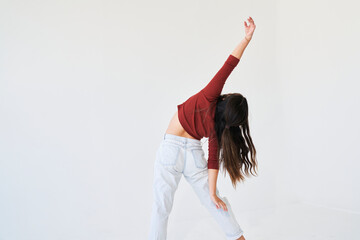 dancing woman lean to side and extends arm