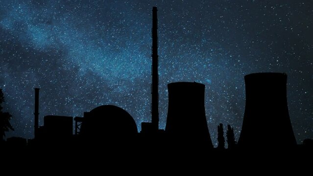 Nuclear power station Skyline, Time Lapse by Night with Stars and Milky Way in Background