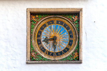 Fototapeta na wymiar Clock of the Church of the Holy Ghost
