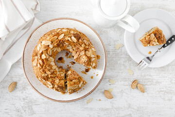 French almond cake with nuts. Top view, overhead
