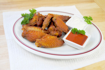 Spicy Deep Fried Buffalo Wings Served with Hot Sauce and Blue Cheese Dressing	