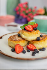 cheesecakes for breakfast with berries in a restaurant