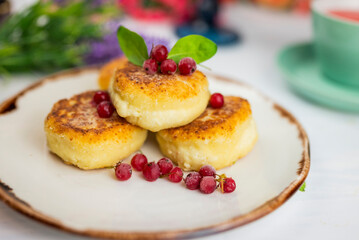cheesecakes for breakfast with berries in a restaurant