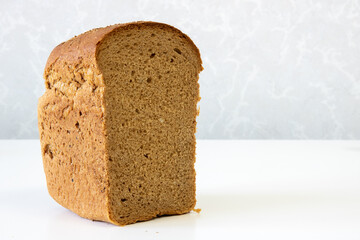 Square black bread on a white background