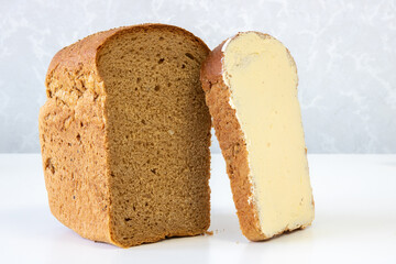Black bread greased with butter, square bread greased with butter