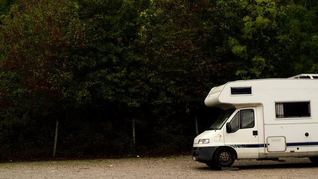 Camper rv camping on nature. Adventure with motor home.