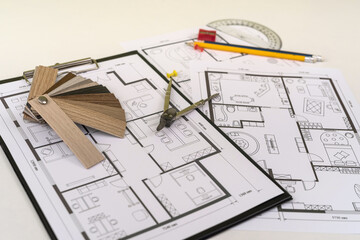Naklejka na ściany i meble house blueprint with wooden vinyl sampler on desk