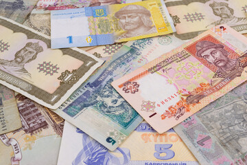 Ukrainian hryvnia, background. A lot of money for the background. Ukrainian money of different time