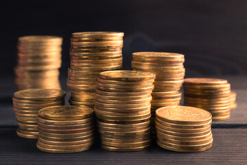 Stack of Gold Coin on Black Background.