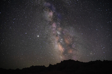 Magical view of the Milky Way starry sky over the Badlands National Park