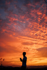 Obraz premium silhouette of a person on the mountain 