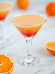 Orange Margarita. Orange juice with strawberry syrup and grenadine