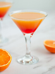 Orange Margarita. Orange juice with strawberry syrup and grenadine