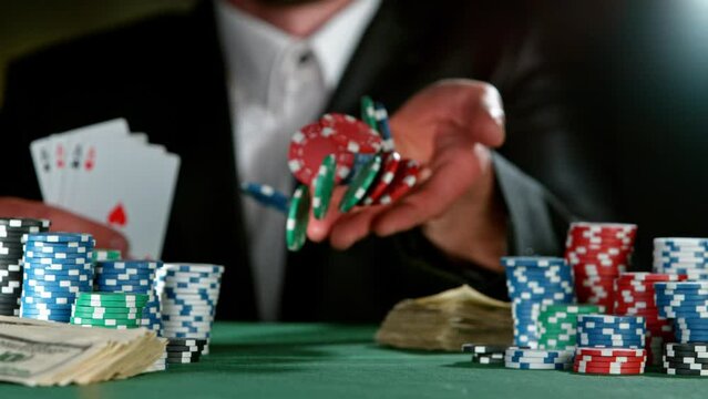 Super slow motion of poker player throwing chip towards camera. Filmed on high speed cinema camera, 1000fps.