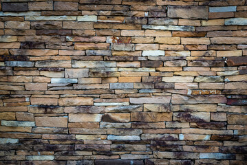 Old vintage retro style bricks wall for abstract brick and stone work background and texture.