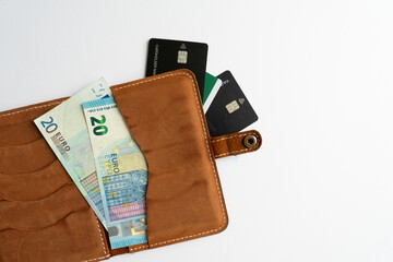 Money and credit cards in the dockholder.