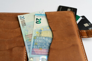 Money and credit cards in the dockholder.