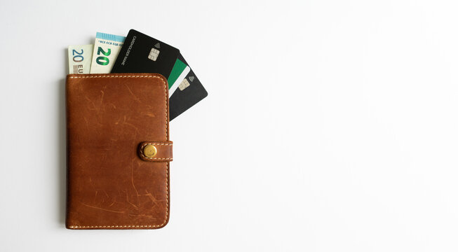 Money and credit cards in the dockholder.