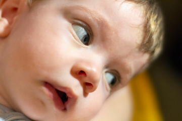 A portrait of a one-year-old baby boy