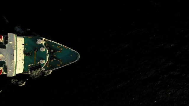 Aerial flight over ship leaving the port in Santo Domingo,  Shot cenital plane