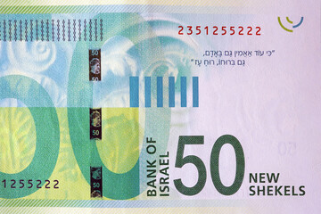 New Israeli money bills (banknotes) of 50 shekel close-up - obrazy, fototapety, plakaty