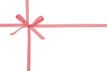 Red and white Christmas ribbon with bow isolated on white background